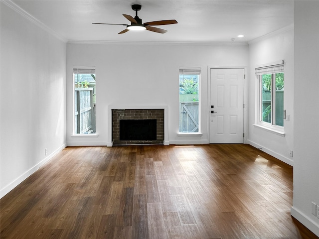 11731 Lakeside Place Dr, Houston, TX 77077 - unfurnished living room featuring plenty of natural light, a ceiling fan, dark wood-type flooring, and crown molding