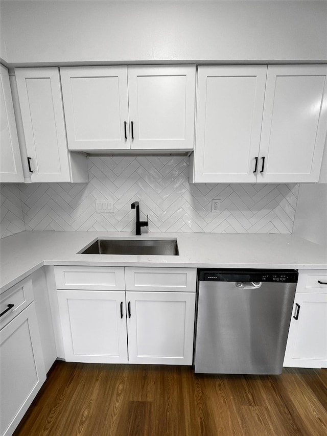 11731 Lakeside Place Dr, Houston, TX 77077 - kitchen featuring dishwasher, a sink, white cabinets, decorative backsplash, and light countertops
