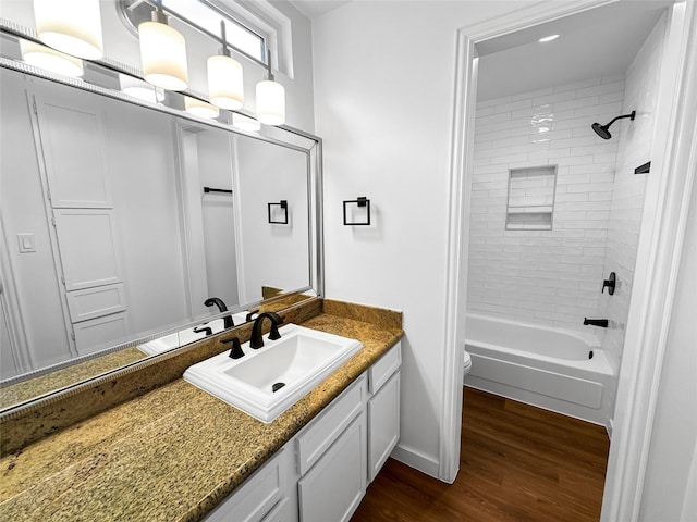 11731 Lakeside Place Dr, Houston, TX 77077 - bathroom with vanity, toilet, wood finished floors, shower / bathtub combination, and baseboards