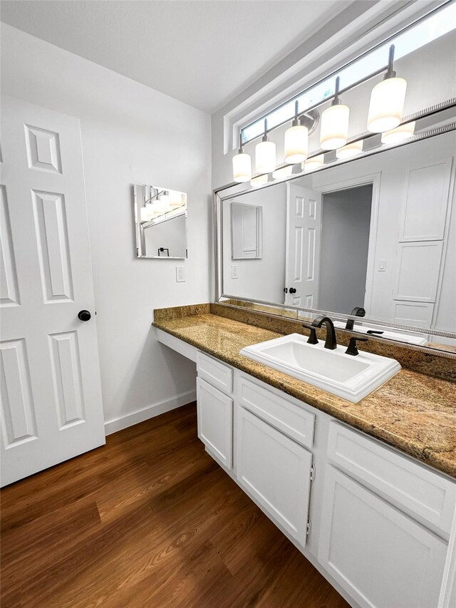 11731 Lakeside Place Dr, Houston, TX 77077 - bathroom featuring wood finished floors, vanity, and baseboards