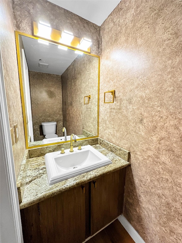 11731 Lakeside Place Dr, Houston, TX 77077 - bathroom featuring vanity, toilet, and baseboards