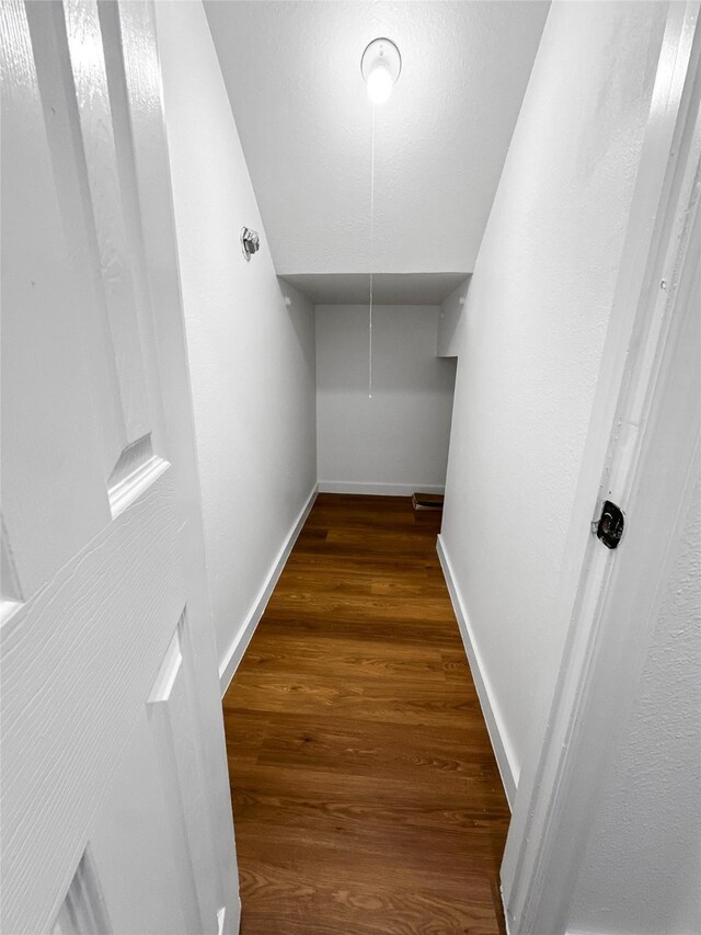 11731 Lakeside Place Dr, Houston, TX 77077 - walk in closet featuring wood finished floors