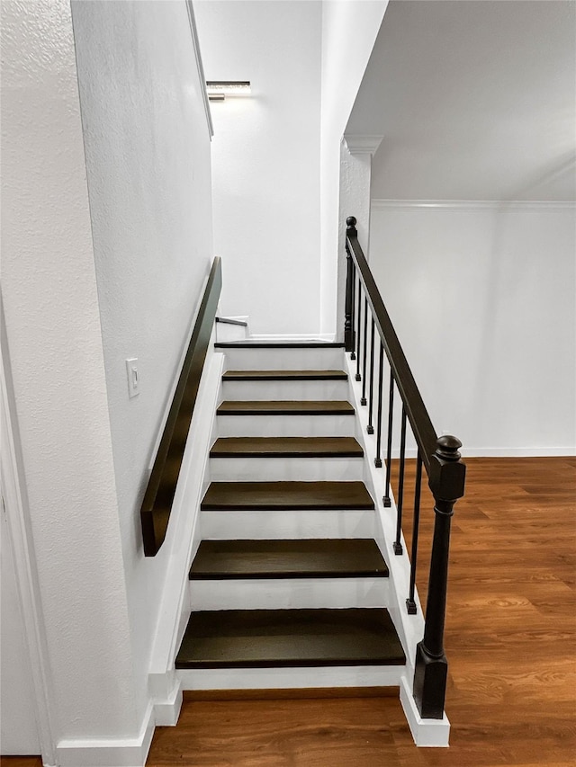 11731 Lakeside Place Dr, Houston, TX 77077 - stairs with baseboards, wood finished floors, and crown molding