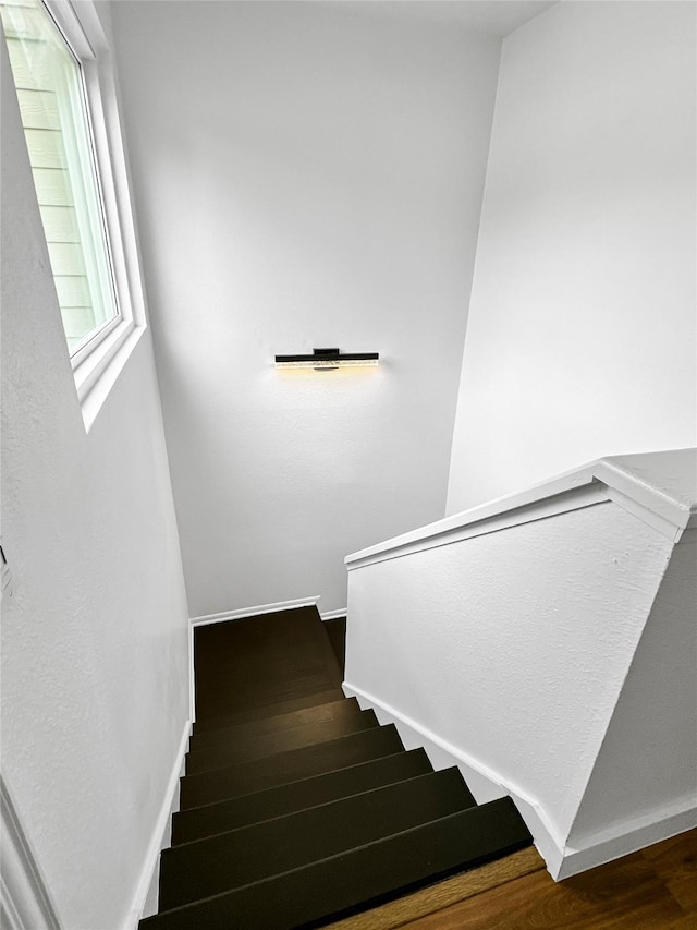 11731 Lakeside Place Dr, Houston, TX 77077 - stairway featuring wood finished floors and baseboards