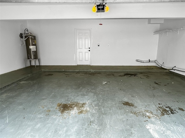 11731 Lakeside Place Dr, Houston, TX 77077 - garage with a garage door opener and electric water heater