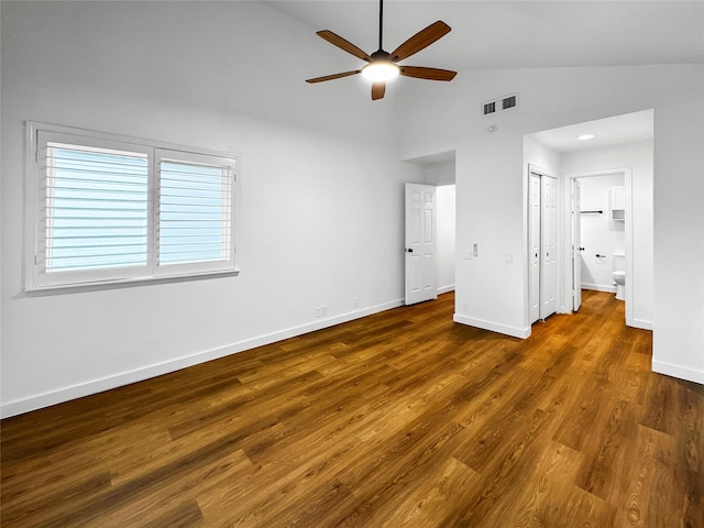 11731 Lakeside Place Dr, Houston, TX 77077 - unfurnished bedroom with wood finished floors, high vaulted ceiling, baseboards, connected bathroom, and ceiling fan