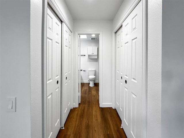 11731 Lakeside Place Dr, Houston, TX 77077 - hall featuring dark wood finished floors and baseboards