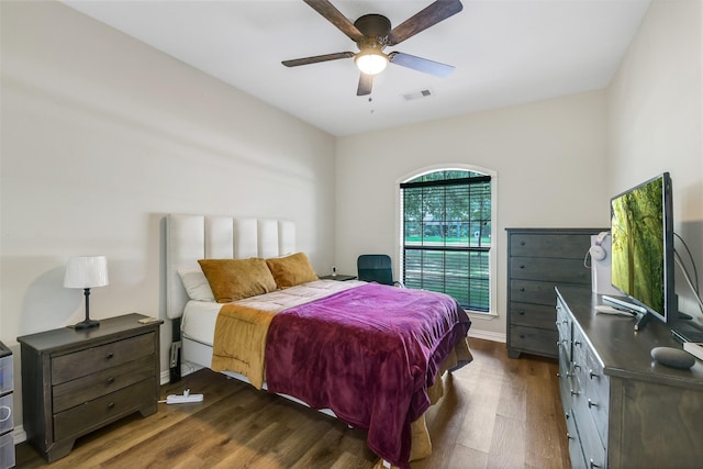 18024 Cindy Ln, Conroe, TX 77302 - bedroom featuring dark wood-style flooring and ceiling fan