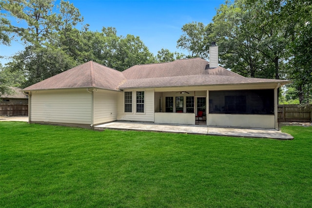 18024 Cindy Ln, Conroe, TX 77302 - rear view of property with a chimney, a patio, a ceiling fan, roof with shingles, and a sunroom
