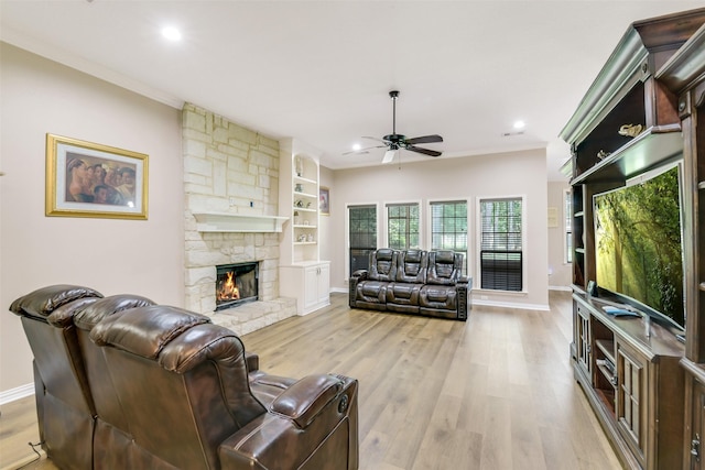 18024 Cindy Ln, Conroe, TX 77302 - living area featuring ceiling fan, baseboards, ornamental molding, recessed lighting, and wood finished floors