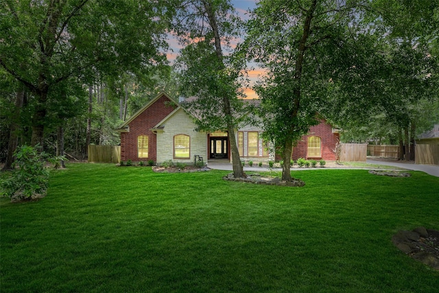 18024 Cindy Ln, Conroe, TX 77302 - view of front of home with stone siding
