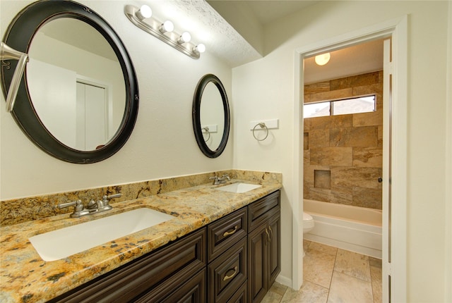 1715 Cobblestone Ct, Richmond, TX 77406 - bathroom with toilet, double vanity, and  shower combination