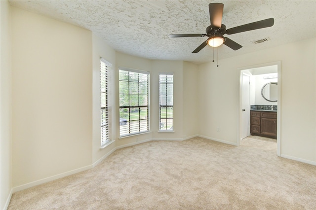 1715 Cobblestone Ct, Richmond, TX 77406 - unfurnished room featuring carpet floors, baseboards, a textured ceiling, and a ceiling fan