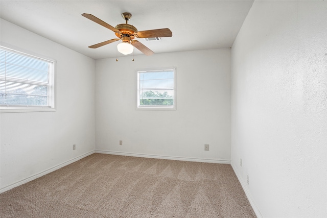 3225 N Jackson St, Santa Fe, TX 77517 - carpeted spare room featuring a ceiling fan and baseboards
