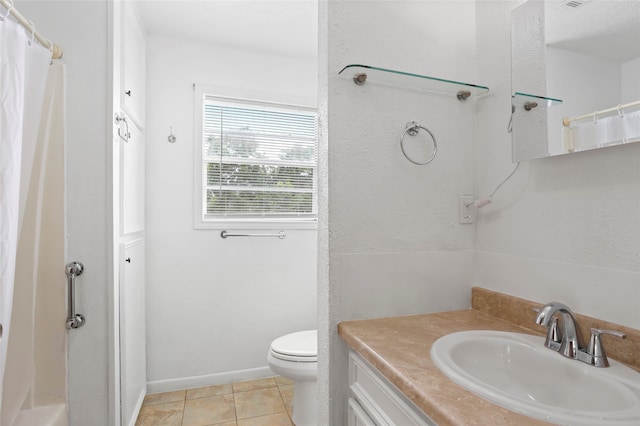 3225 N Jackson St, Santa Fe, TX 77517 - bathroom with vanity, toilet, tile patterned floors, and curtained shower