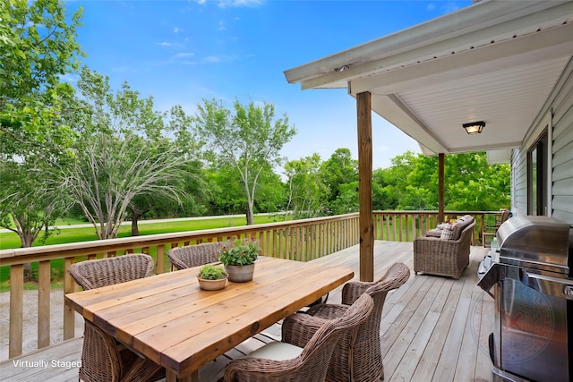 3225 N Jackson St, Santa Fe, TX 77517 - deck with area for grilling, view of scattered trees, and outdoor dining area