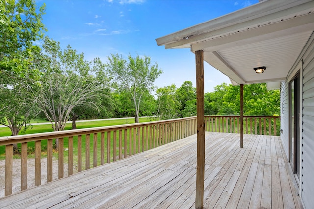 3225 N Jackson St, Santa Fe, TX 77517 - wooden terrace with a yard and view of scattered trees
