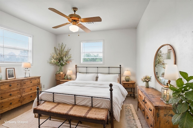 3225 N Jackson St, Santa Fe, TX 77517 - bedroom with light colored carpet and ceiling fan