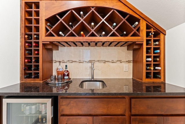 82 Valera Ridge Dr, Spring, TX 77389 - wine room with beverage cooler and bar area