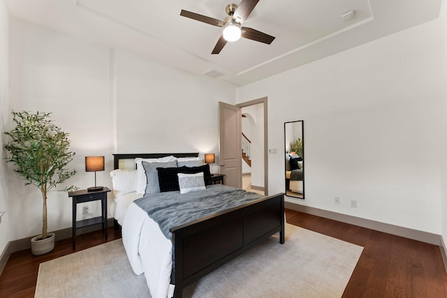 82 Valera Ridge Dr, Spring, TX 77389 - bedroom with wood finished floors, baseboards, and ceiling fan