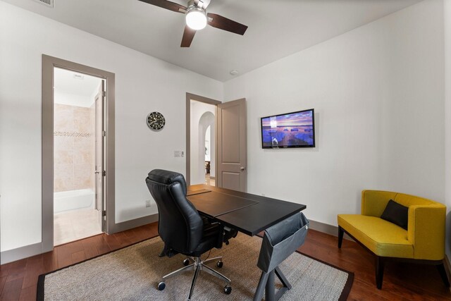 82 Valera Ridge Dr, Spring, TX 77389 - office space featuring wood finished floors, arched walkways, ceiling fan, and baseboards