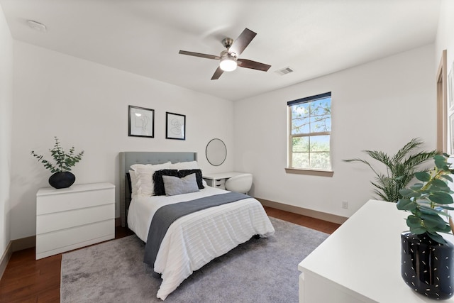 82 Valera Ridge Dr, Spring, TX 77389 - bedroom featuring wood finished floors, baseboards, and a ceiling fan