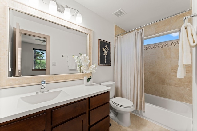 82 Valera Ridge Dr, Spring, TX 77389 - full bathroom featuring toilet, vanity, shower / bath combo with shower curtain, and tile patterned flooring