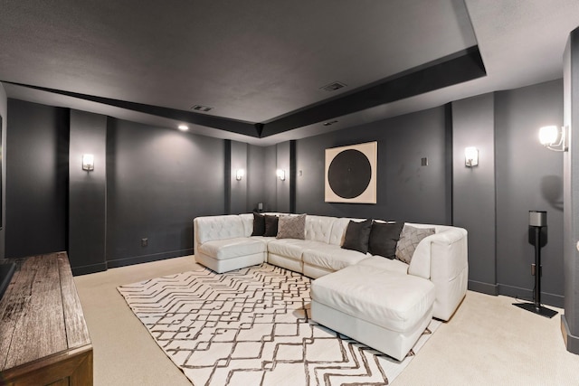 82 Valera Ridge Dr, Spring, TX 77389 - carpeted cinema room featuring a tray ceiling and baseboards