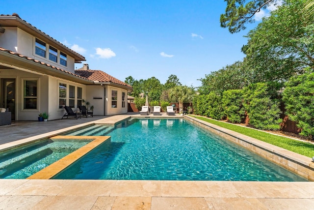 82 Valera Ridge Dr, Spring, TX 77389 - view of swimming pool featuring a patio area and a pool with connected hot tub