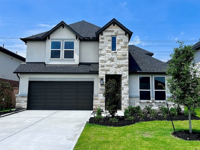 21910 Wycombe Terrace Way, Cypress, TX 77433 - view of front facade with stucco siding, roof with shingles, stone siding, and concrete driveway