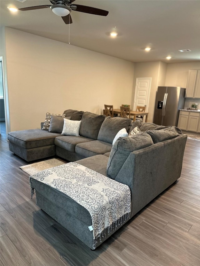 13556 Bowfin Dr, Conroe, TX 77384 - living room with a ceiling fan, wood finished floors, and recessed lighting