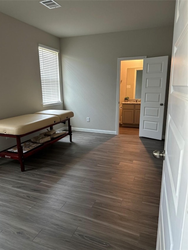 13556 Bowfin Dr, Conroe, TX 77384 - bedroom featuring dark wood finished floors and baseboards