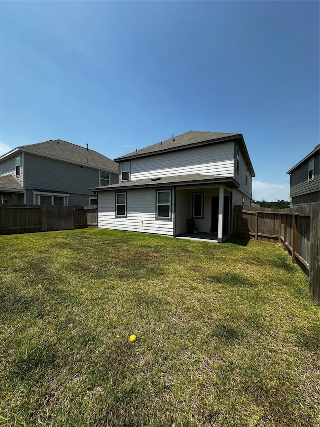 13556 Bowfin Dr, Conroe, TX 77384 - back of house with a patio