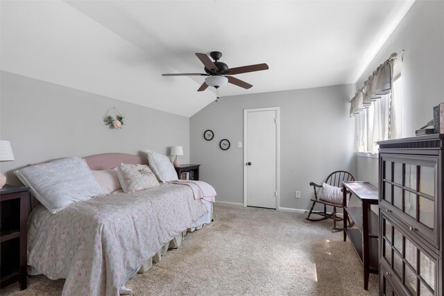8219 Magnolia Glen Dr, Humble, TX 77346 - carpeted bedroom featuring baseboards, vaulted ceiling, and ceiling fan