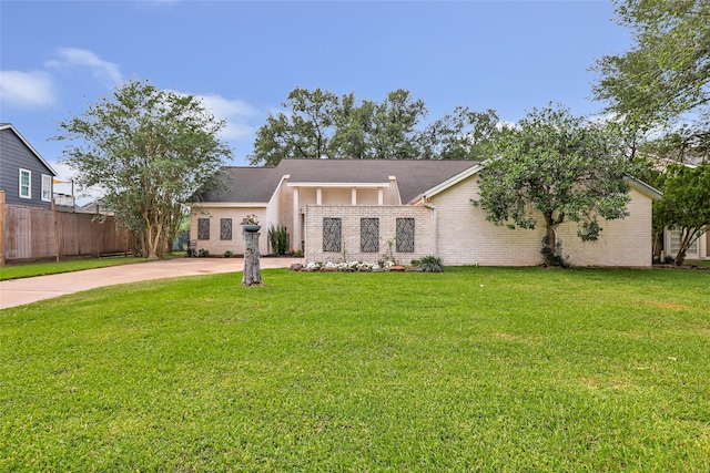 8219 Magnolia Glen Dr, Humble, TX 77346 - mid-century modern home with concrete driveway and brick siding