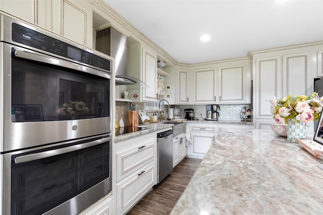 8219 Magnolia Glen Dr, Humble, TX 77346 - kitchen featuring appliances with stainless steel finishes, open shelves, decorative backsplash, a sink, and wall chimney range hood