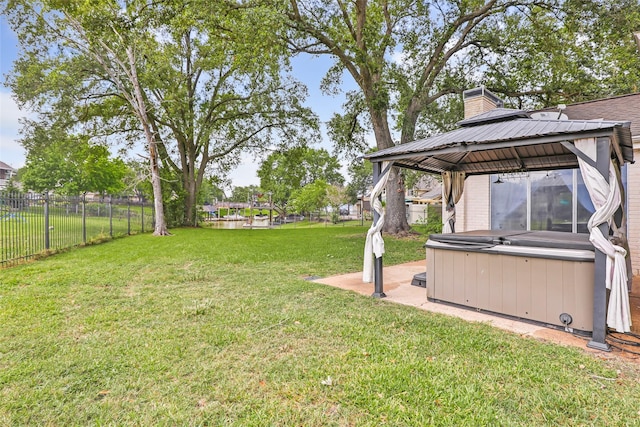 8219 Magnolia Glen Dr, Humble, TX 77346 - view of yard with a hot tub, a gazebo, and a patio area