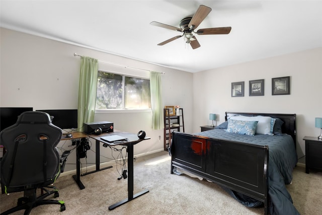 8219 Magnolia Glen Dr, Humble, TX 77346 - bedroom featuring light carpet, a desk, baseboards, and ceiling fan
