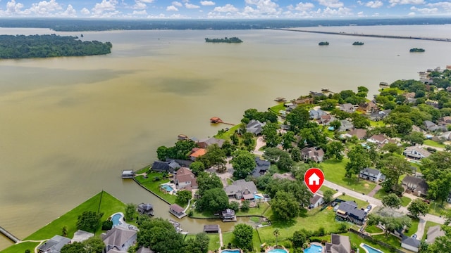 8219 Magnolia Glen Dr, Humble, TX 77346 - aerial view of residential area with a large body of water