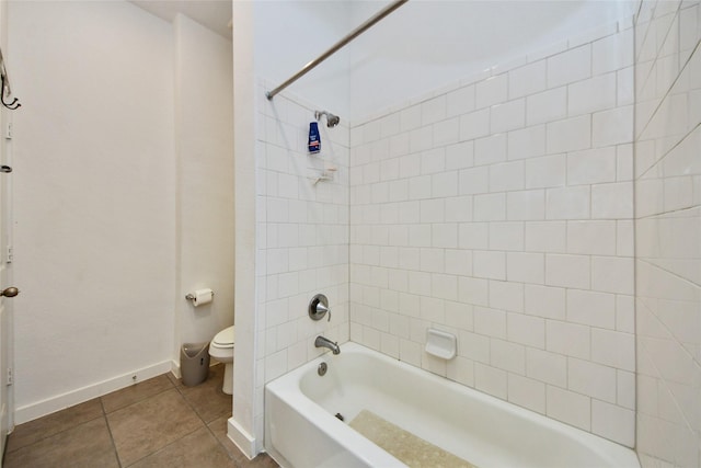 23619 Bottlebrush Terrace Trl, Katy, TX 77493 - bathroom featuring toilet, tile patterned flooring,  shower combination, and baseboards