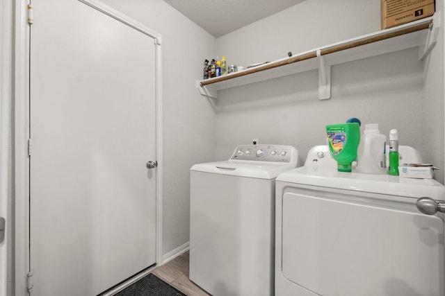 15111 Raffia Leaves Way, Houston, TX 77090 - laundry area with independent washer and dryer