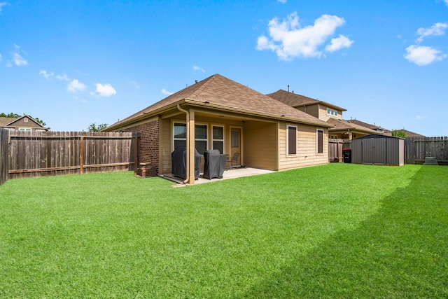 15111 Raffia Leaves Way, Houston, TX 77090 - back of property featuring a patio and a shingled roof