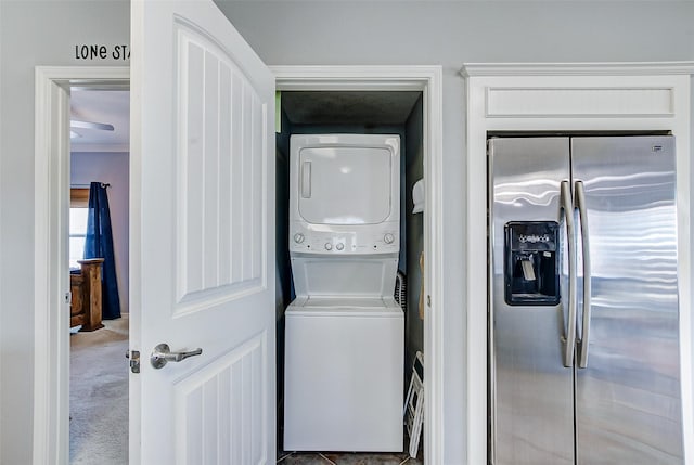 2774 Gulfview Ln, Crystal Beach, TX 77650 - laundry area with stacked washer / dryer and carpet floors