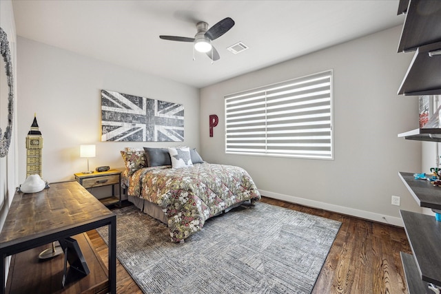 2707 Rusk St, Houston, TX 77003 - bedroom with wood finished floors, baseboards, and a ceiling fan