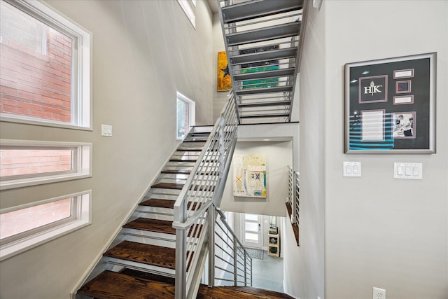 2707 Rusk St, Houston, TX 77003 - staircase featuring a towering ceiling