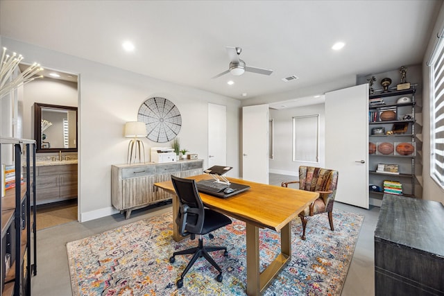 2707 Rusk St, Houston, TX 77003 - office space with a ceiling fan, baseboards, recessed lighting, and finished concrete flooring