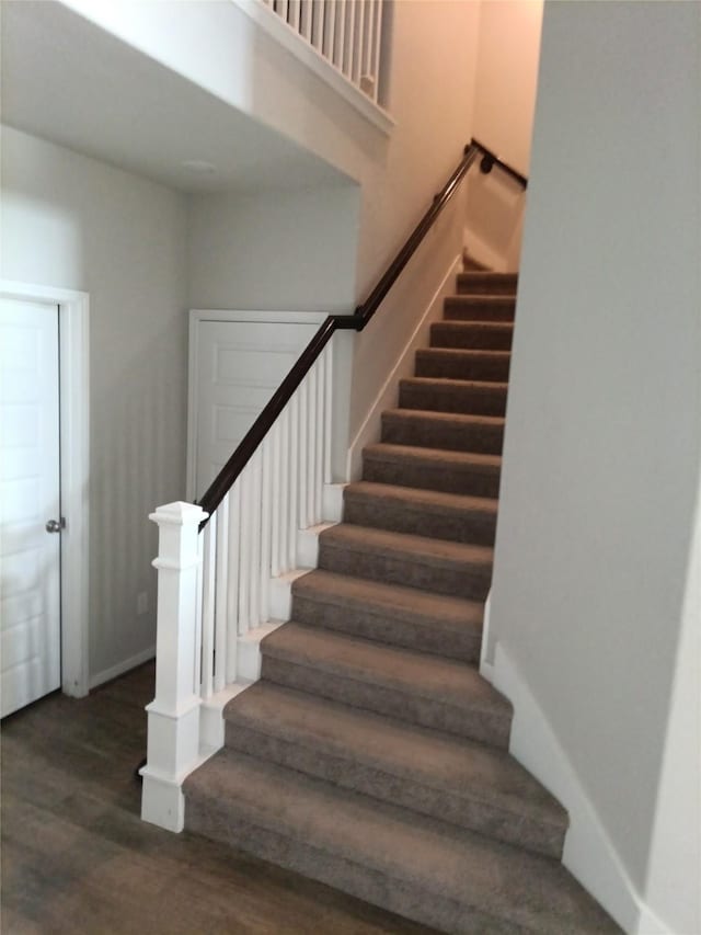 3619 Dry Creek Dr, Missouri City, TX 77459 - stairway featuring wood finished floors and baseboards