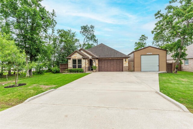 2323 Foley Rd, Crosby, TX 77532 - view of front of house featuring concrete driveway and an attached garage