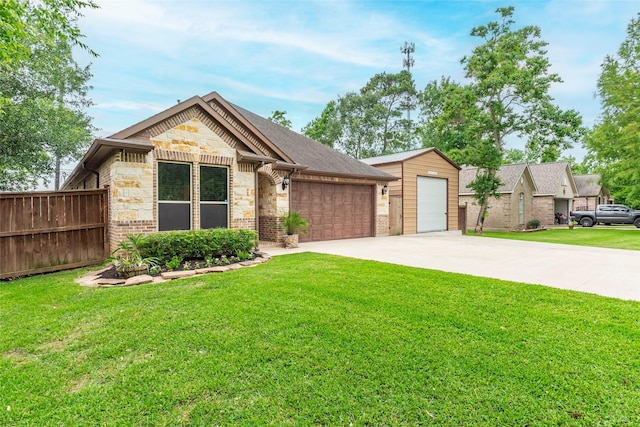 2323 Foley Rd, Crosby, TX 77532 - view of front of home with stone siding, driveway, an attached garage, and brick siding
