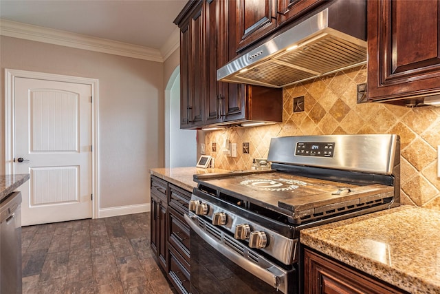 2323 Foley Rd, Crosby, TX 77532 - kitchen featuring stainless steel appliances, extractor fan, crown molding, light stone counters, and decorative backsplash